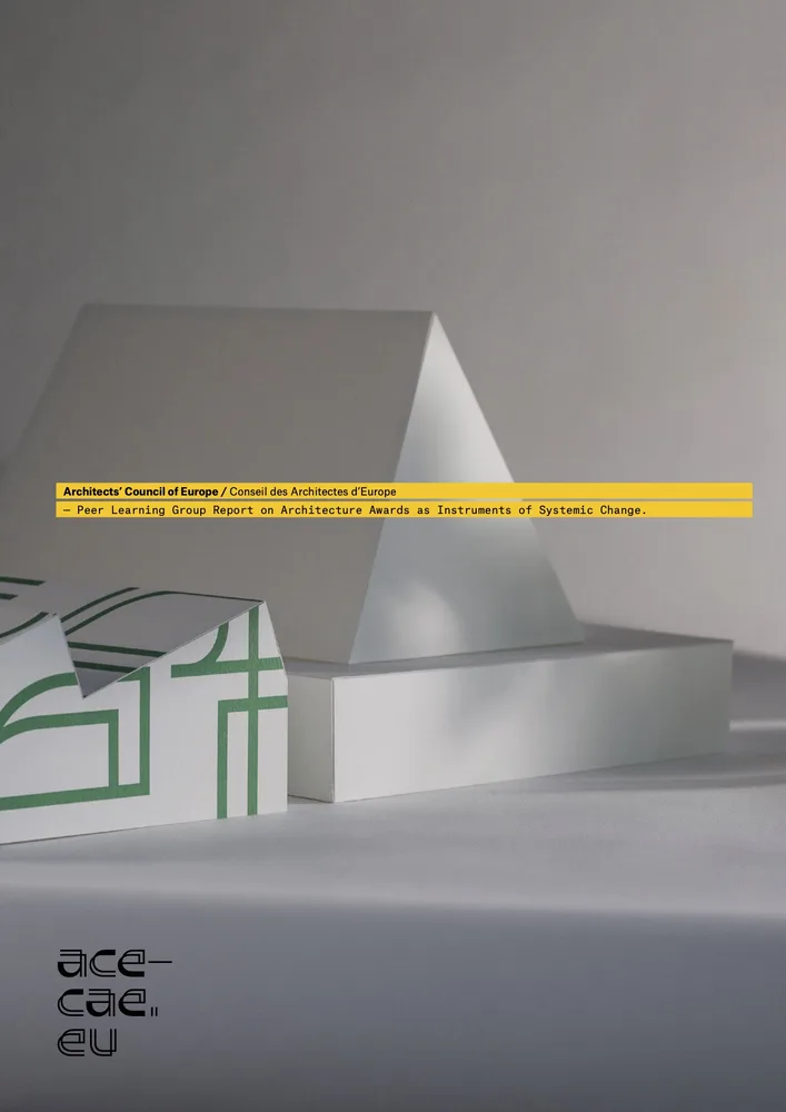 Papiermodell mit gelben Schriftband, ACE Arch-Award, report 2025